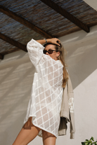 Fredrika wearing mauire and eve cotton natural lace shirt front view