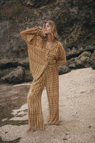 Womens tan cotton tie dye pant, styled with matching shirt, front view