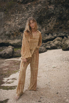 Womens tan cotton tie dye shirt, styled with matching pant, front view