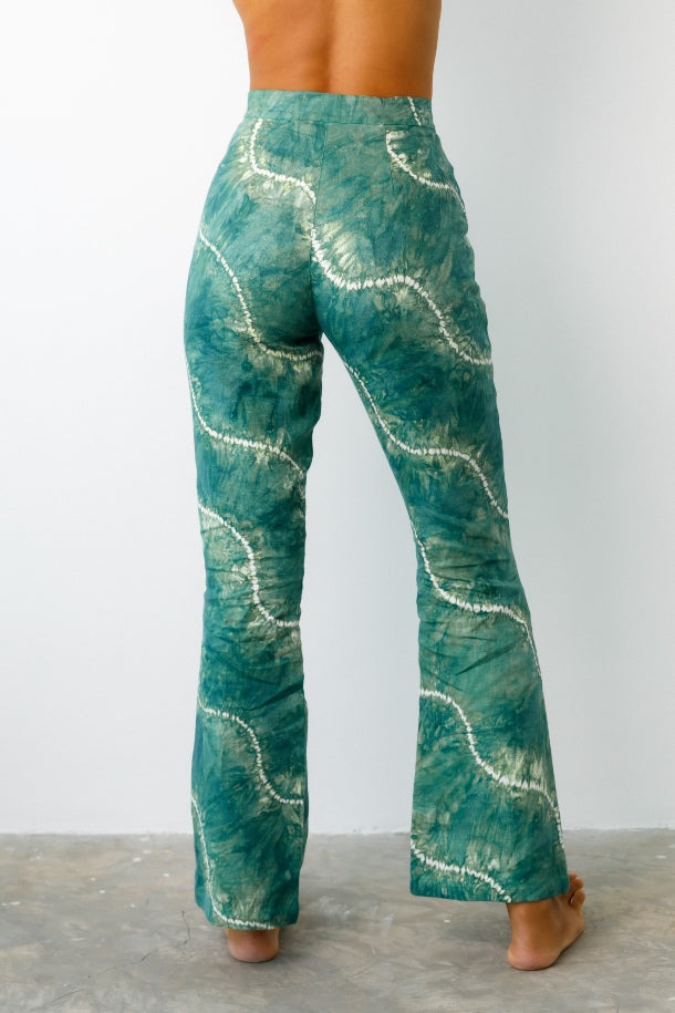 green swirl tie dye flared pants