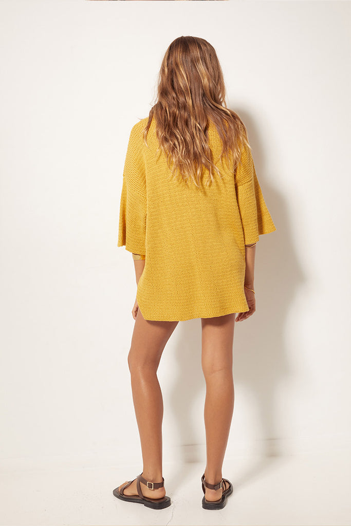 womens knit top golden hue back view
